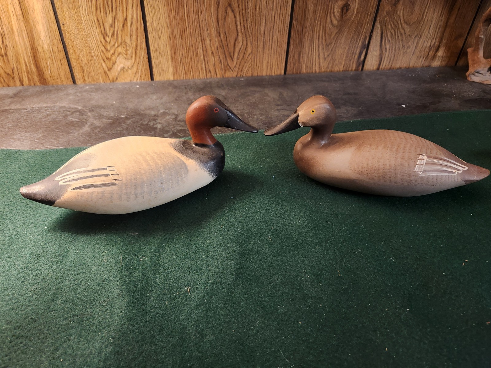 Pair Clarence F. Bauer Carved Canvasback Duck Decoys