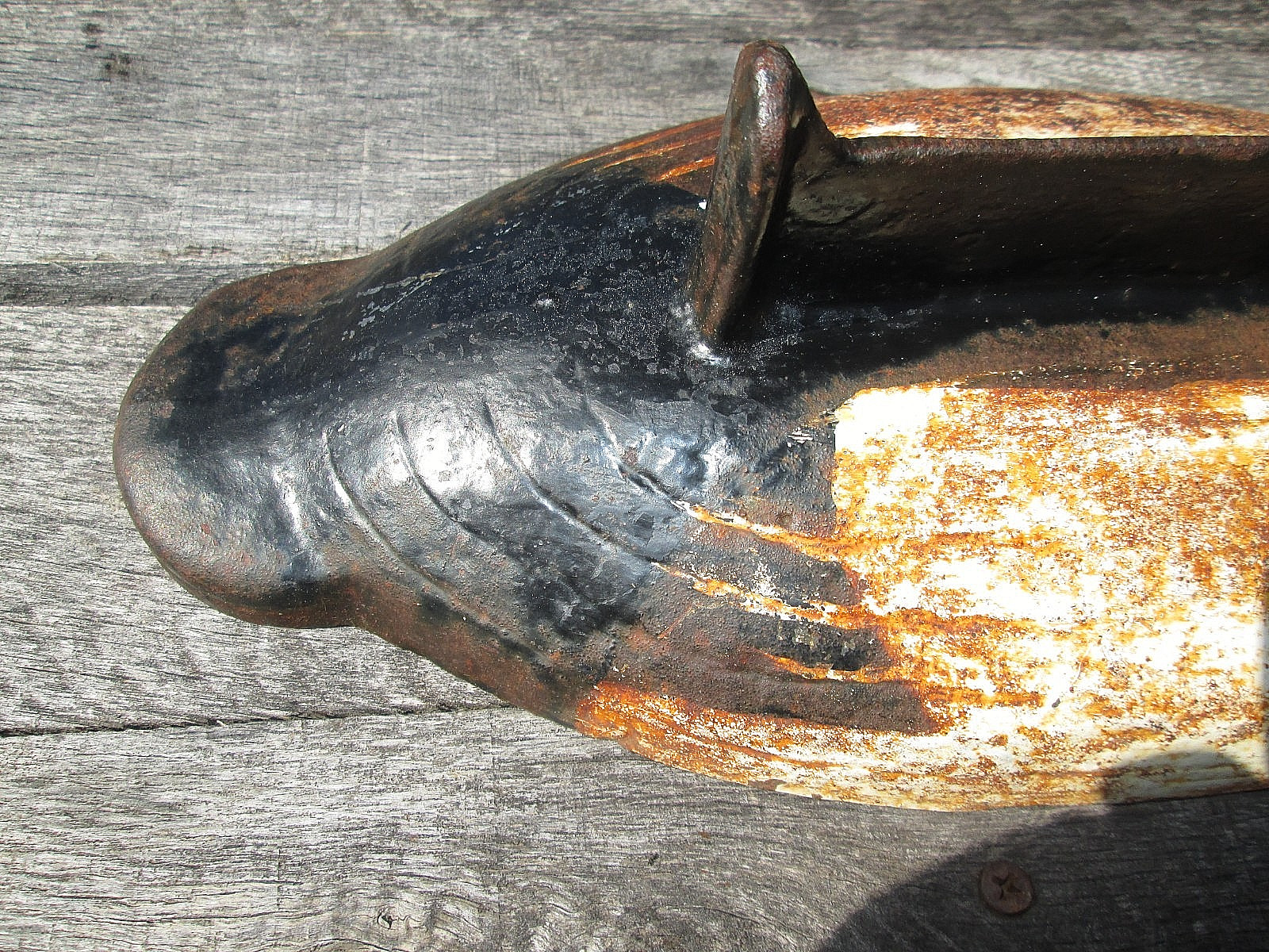 Vintage cast iron duck decoy boot scrape canvasback
